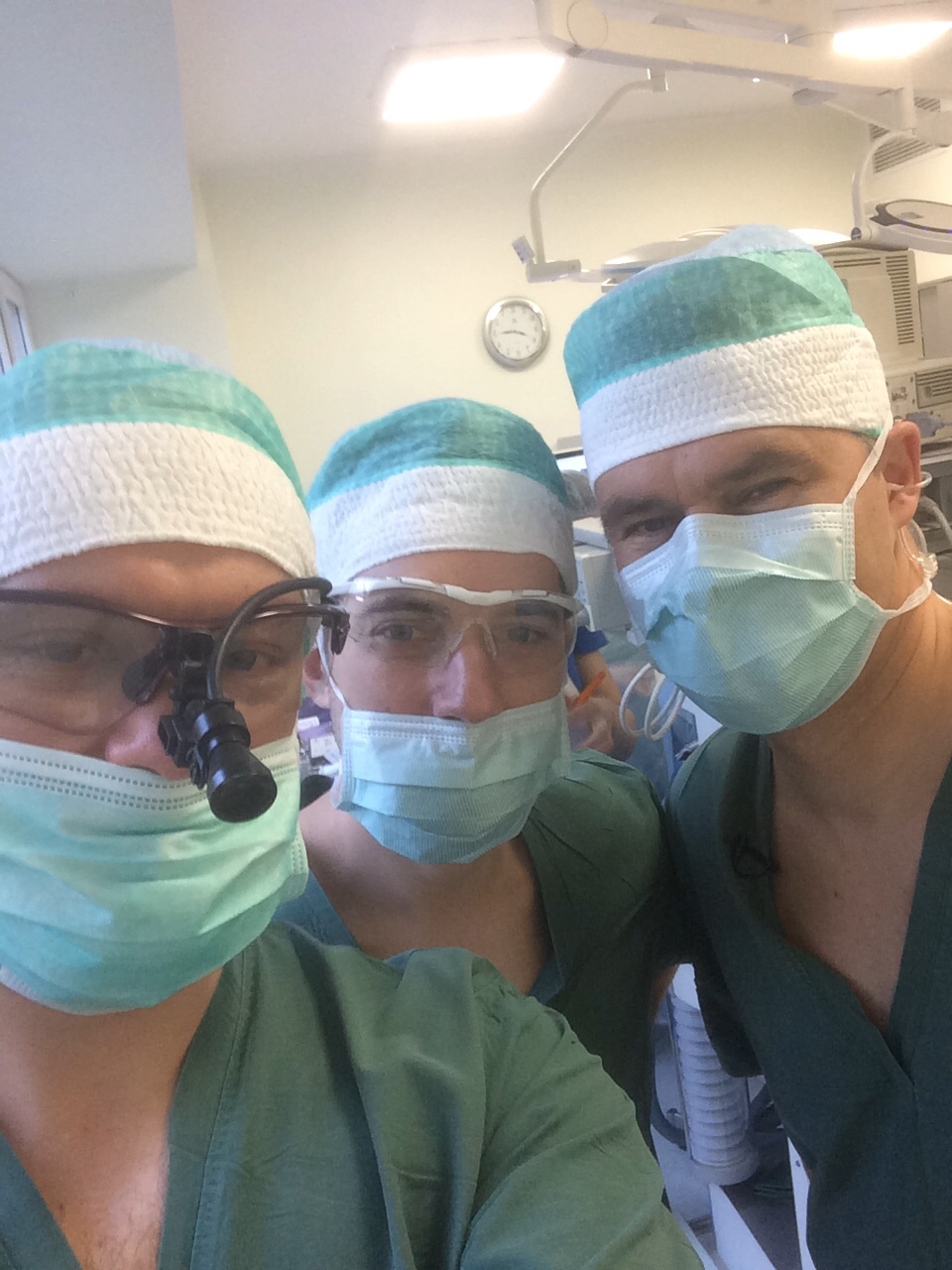 Dr. Senyuk, Dr. Antipov, and Dr. Salms on surgery day in Riga